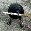crow with knife CAW icon symbol